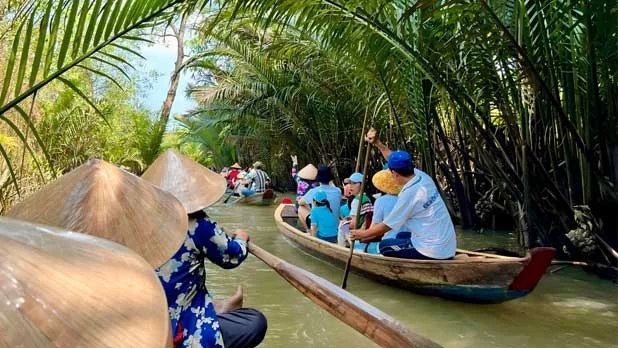 Exploring The Mighty Mekong Delta Boat Trip with Vietnam honeymoon trip